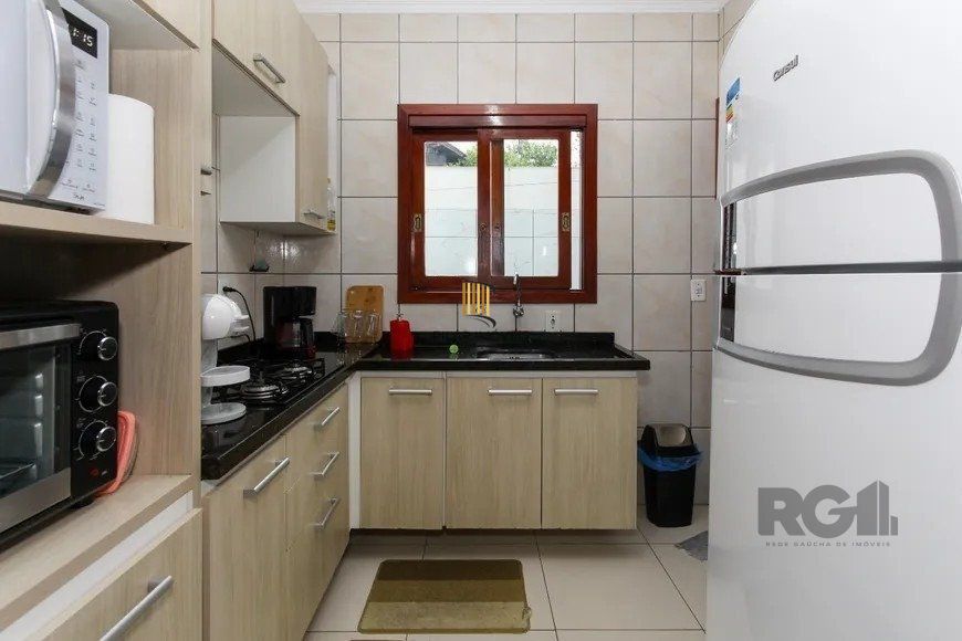 Casa em condomínio com 3 dormitórios, 1 vaga no bairro Nossa Senhora das Graças, Canoas!