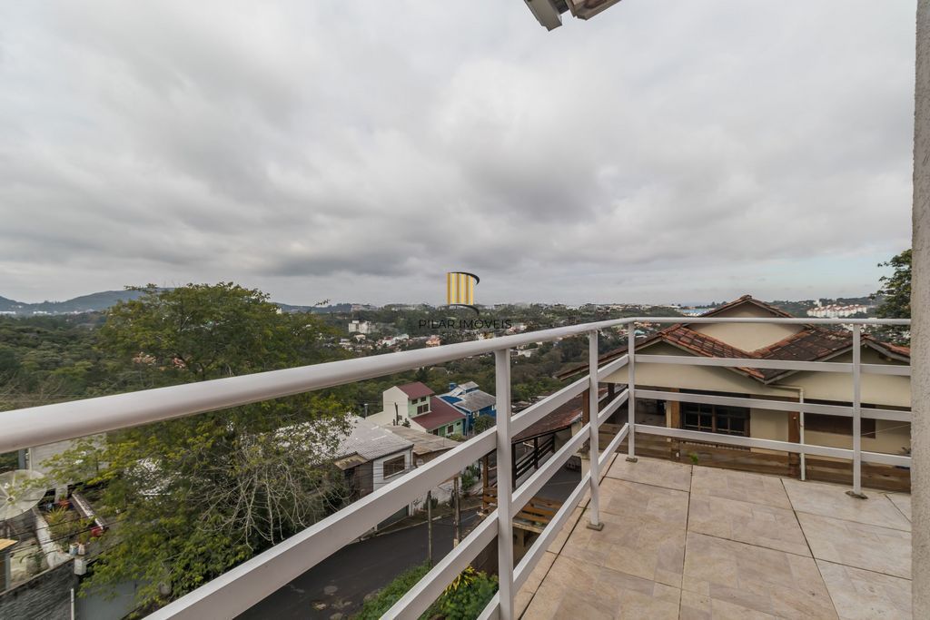 Casa de 6 dormitórios à venda Bairro Vila Nova - Porto Alegre
