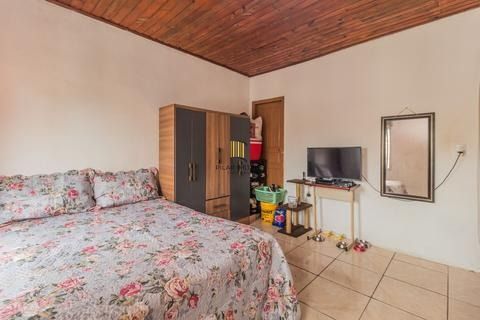 Casa 2 dorms à venda Avenida Outeiro, Coronel Aparício Borges - Porto Alegre