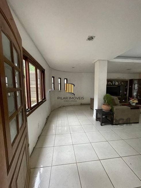 Casa de 4 dormitórios, bairro Ipanema