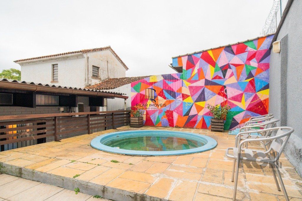 Casa 4 dormitórios no bairro Nonoai