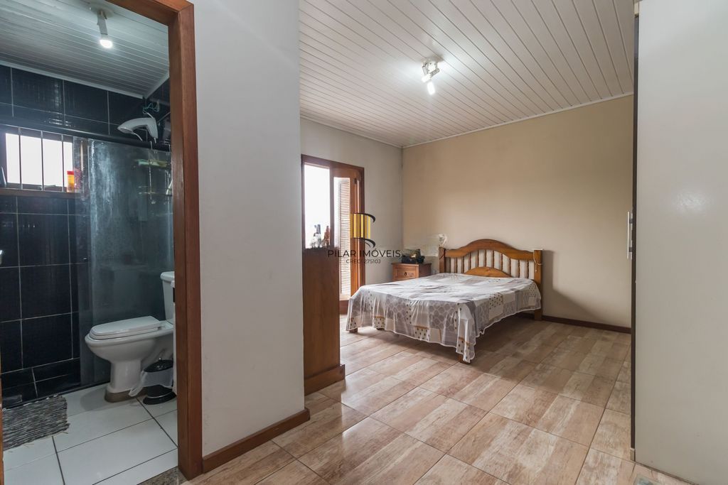 Casa de 6 dormitórios à venda Bairro Vila Nova - Porto Alegre