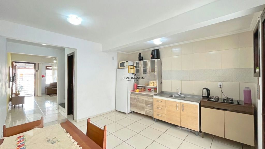 Casa de 2 dormitórios à venda Rua Heitor Kramer, Guarujá - Porto Alegre