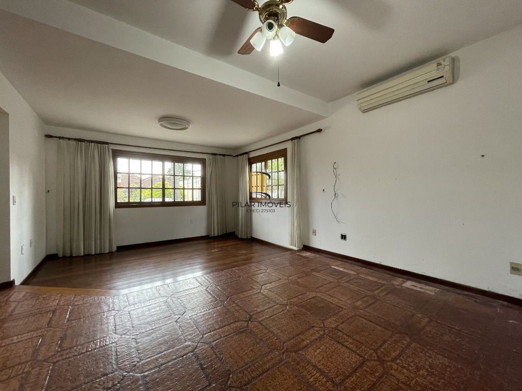 Casa 6 dormitórios no bairro Partenon