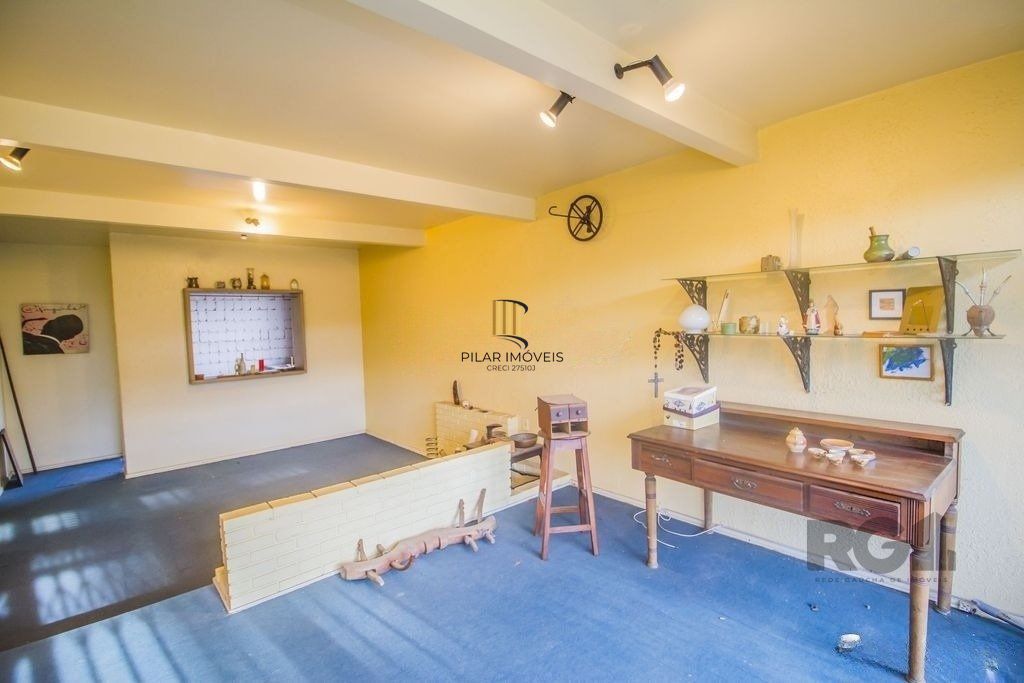 Casa de 4 dormitórios, bairro Santa Tereza