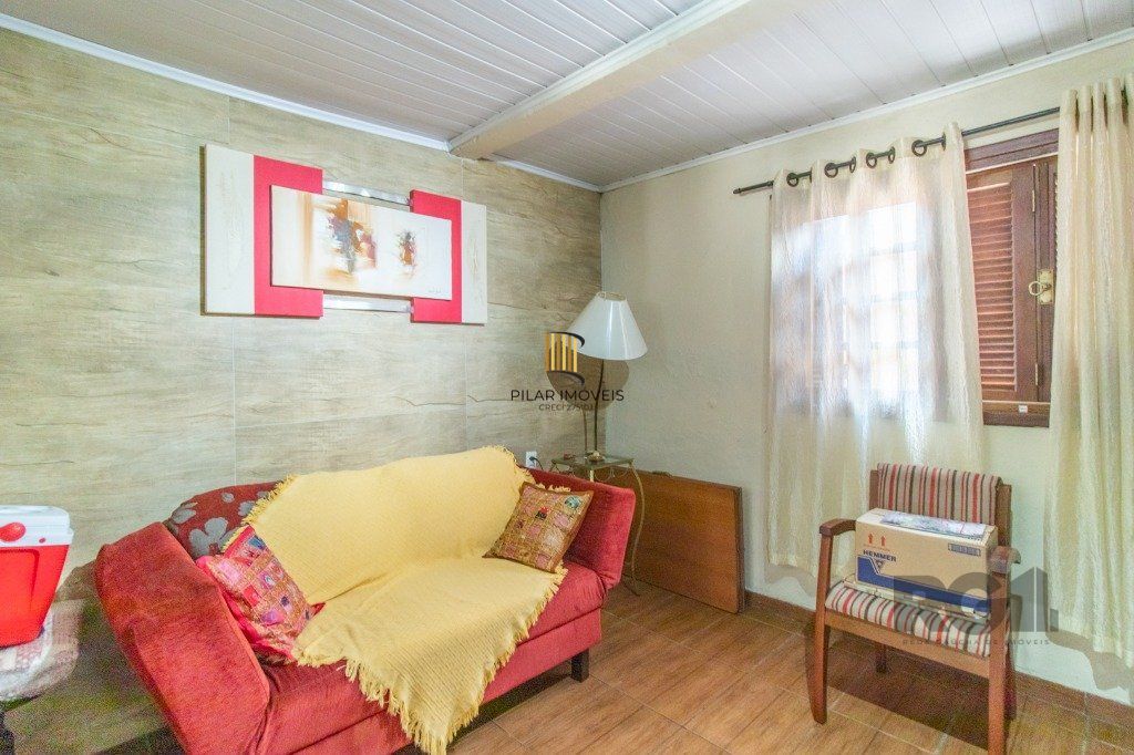 Casa com 3 dormitórios e 3 vagas no bairro Santa Tereza