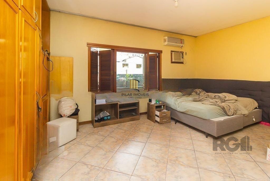 Casa 3 dormitórios no bairro Glória