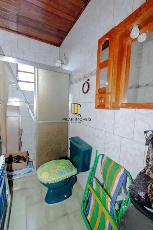 Casa à venda com 3 dormitórios, 1 suíte e espaço gourmet em terreno alto