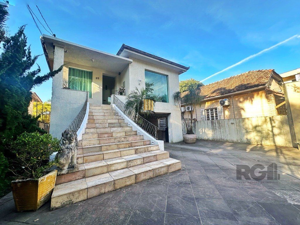 Casa comercial ou residencial com 14 vagas próxima á av. Teresópolis - Pilar Imóveis