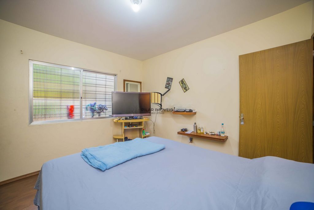 Casa de 4 dormitórios à venda no Bairro Santa Tereza - Porto Alegre