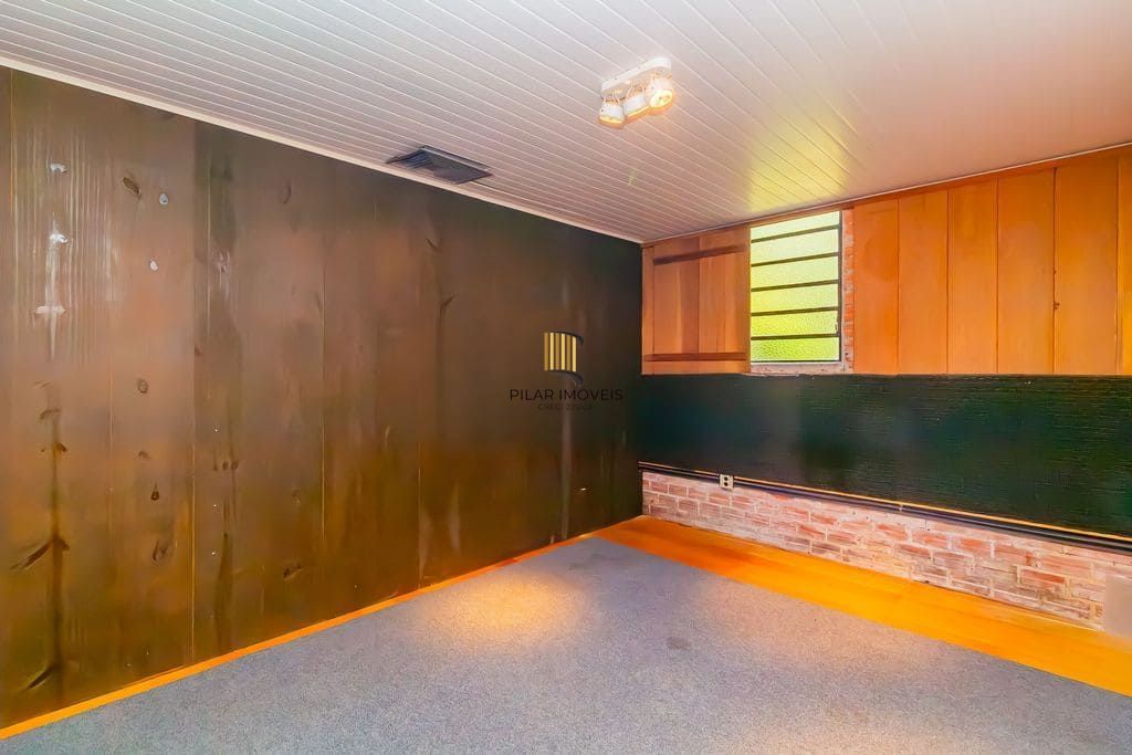 Casa de 3 dormitórios, no Bairro Ponta Grossa - Porto Alegre