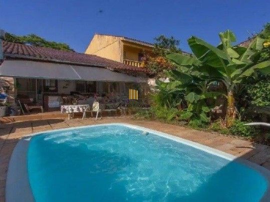 Casa 3 dormitórios no bairro Nonoai