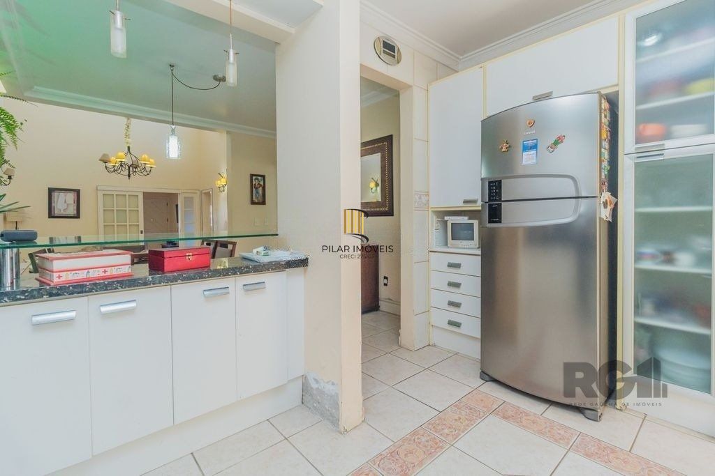 Casa 224m² - 3 dormitórios, 4 vagas no bairro Parque Santa Fé