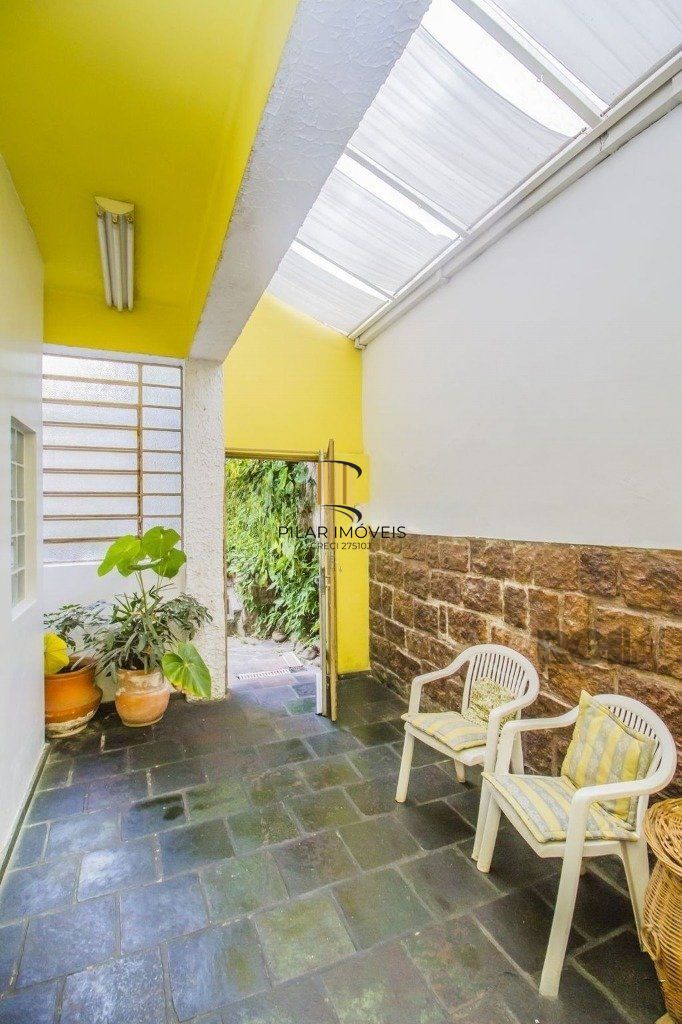 Casa de 4 dormitórios, bairro Santa Tereza