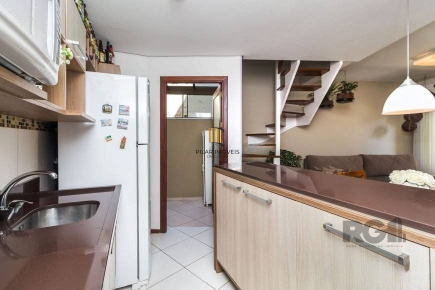 Casa em condomínio de 84m² - 2 dormitórios, 1 suíte e 1 vaga no bairro Ipanema