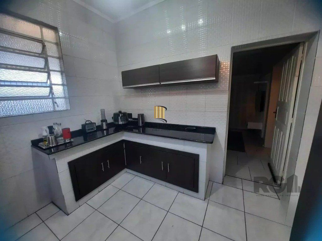 Casa de 3 dormitórios, no bairro Glória