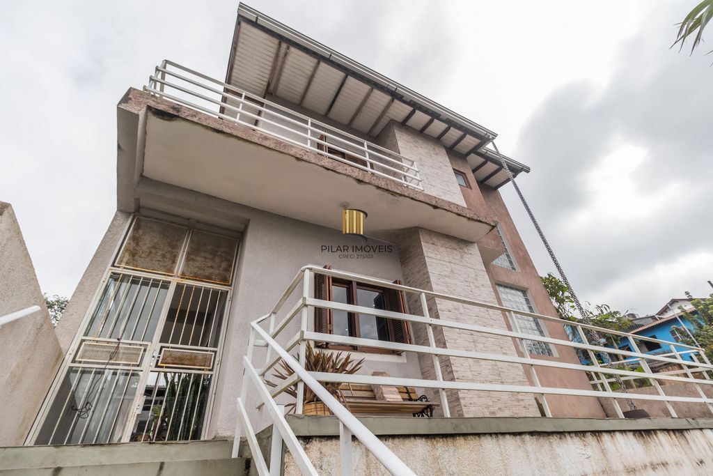 Casa de 6 dormitórios à venda Bairro Vila Nova - Porto Alegre