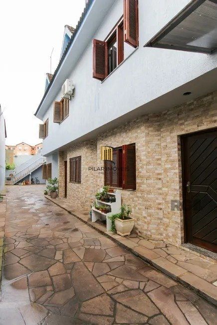 Casa em condomínio com 3 dormitórios, 1 vaga no bairro Nossa Senhora das Graças, Canoas! - Pilar Imóveis