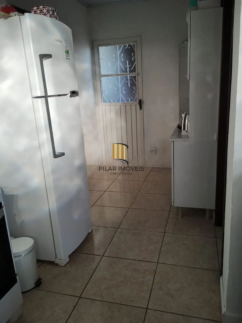 Casa de 3 dormitórios e 111m² à venda em Jardim Botânico, Porto Alegre.