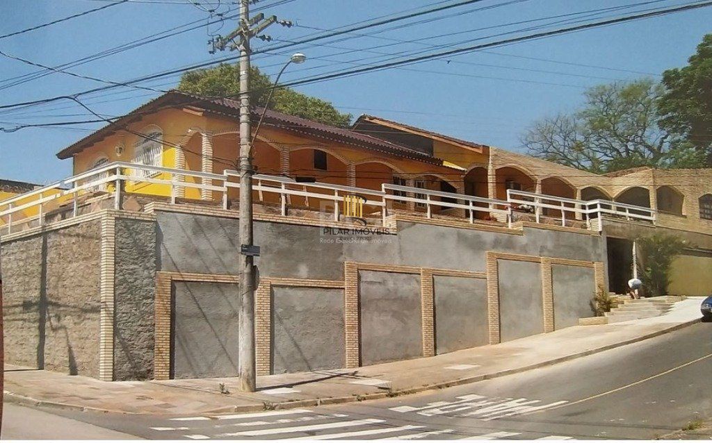 Casa 7 dormitórios no bairro Glória - Pilar Imóveis