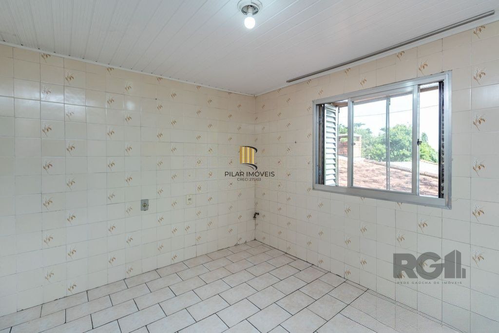 Casa de 4 dormitórios no bairro Camaquã