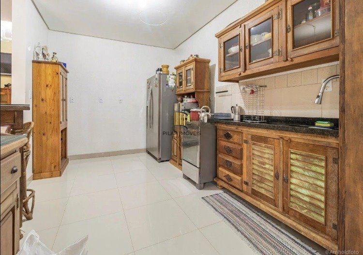 Casa de 3 dormitórios à venda em Ipanema, Porto Alegre.