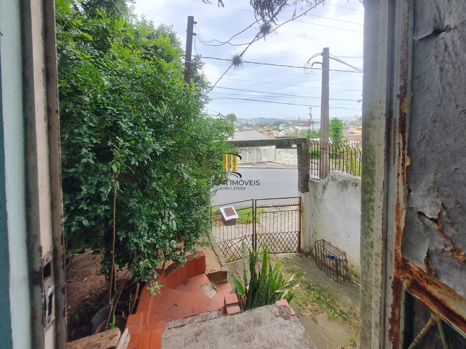 Terreno bem localizado com chalé e edícula – ótima oportunidade para investir!