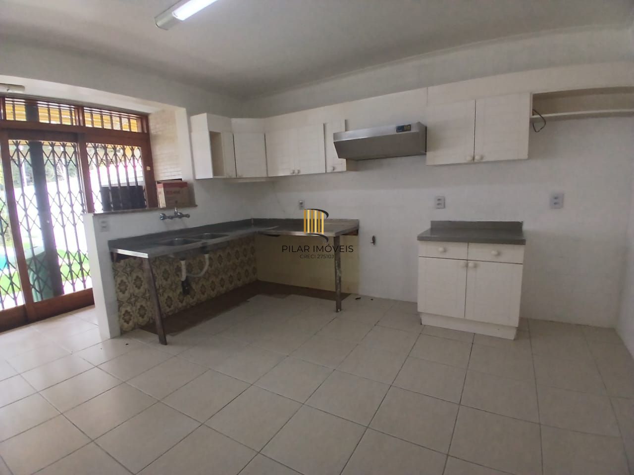 Casa com piscina e patio ampla no bairro Boa Vista, Porto Alegre/RS