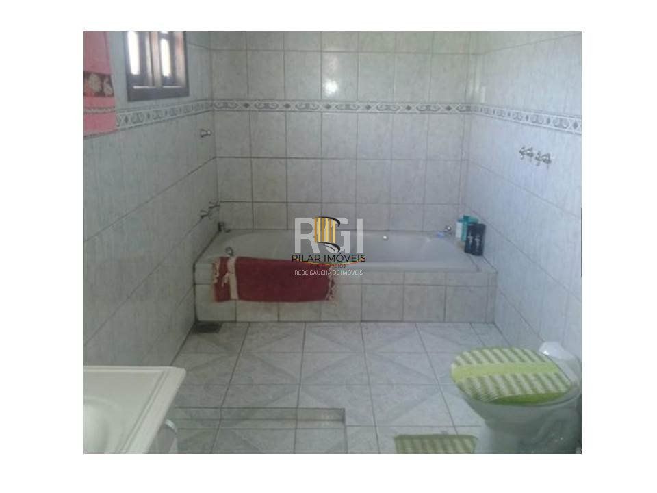 Casa para Venda - 634m², 2 dormitórios, sendo 1 suites, 3 vagas - Lomba do Pinheiro