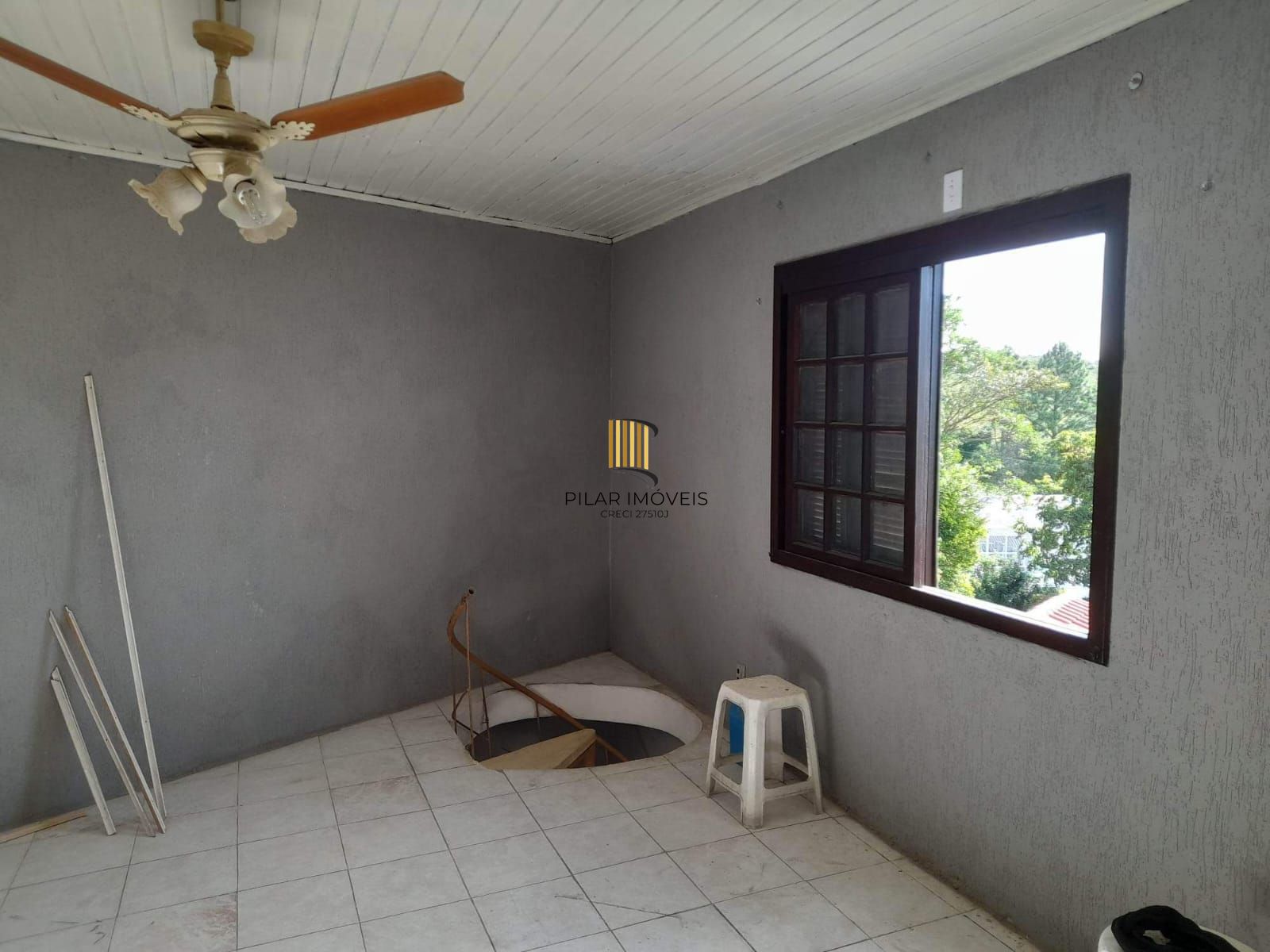 Casa à venda com piscina no bairro Glória, Zona Sul de Porto Alegre – 207m² construídos, pátio amplo e excelente potencial residencial