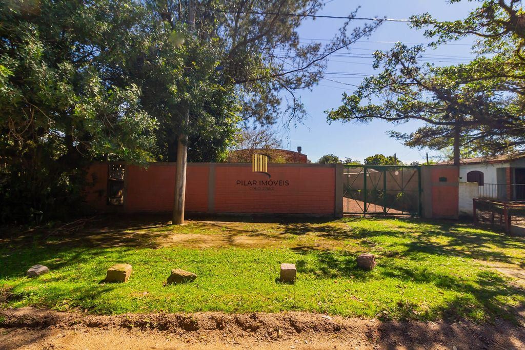 Casa de 3 dormitórios, no Bairro Ponta Grossa - Porto Alegre