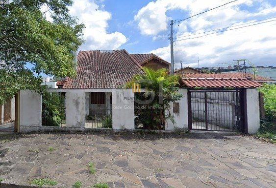 Casa 3 dormitórios no bairro Nonoai - Pilar Imóveis