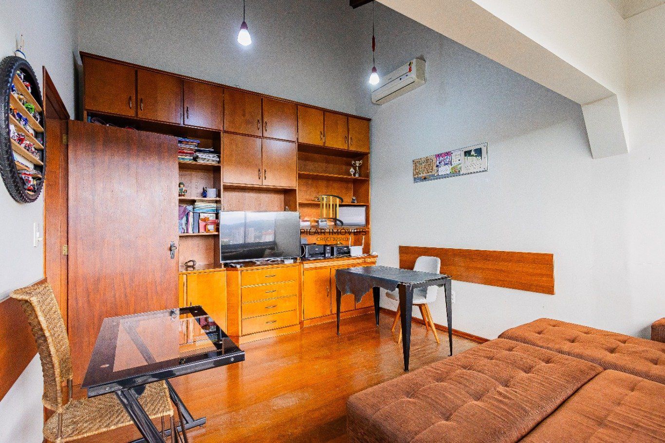 Casa de 4 dormitórios e 208m² à venda no Bairro Jardim Botânico, Porto Alegre.