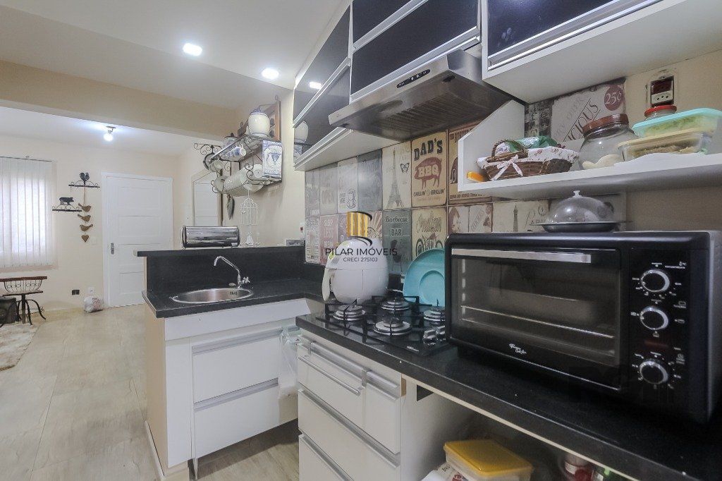 Casa em condomínio, 77m², 2 dormitórios e 2 vagas no bairro Humaitá