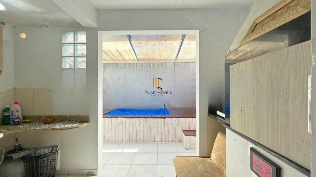 Casa de 2 dormitórios à venda Rua Heitor Kramer, Guarujá - Porto Alegre