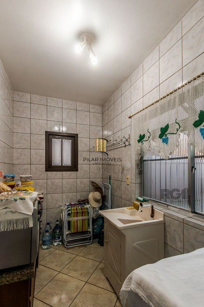 Casa de 4 dormitórios no bairro Santa Rosa de Lima