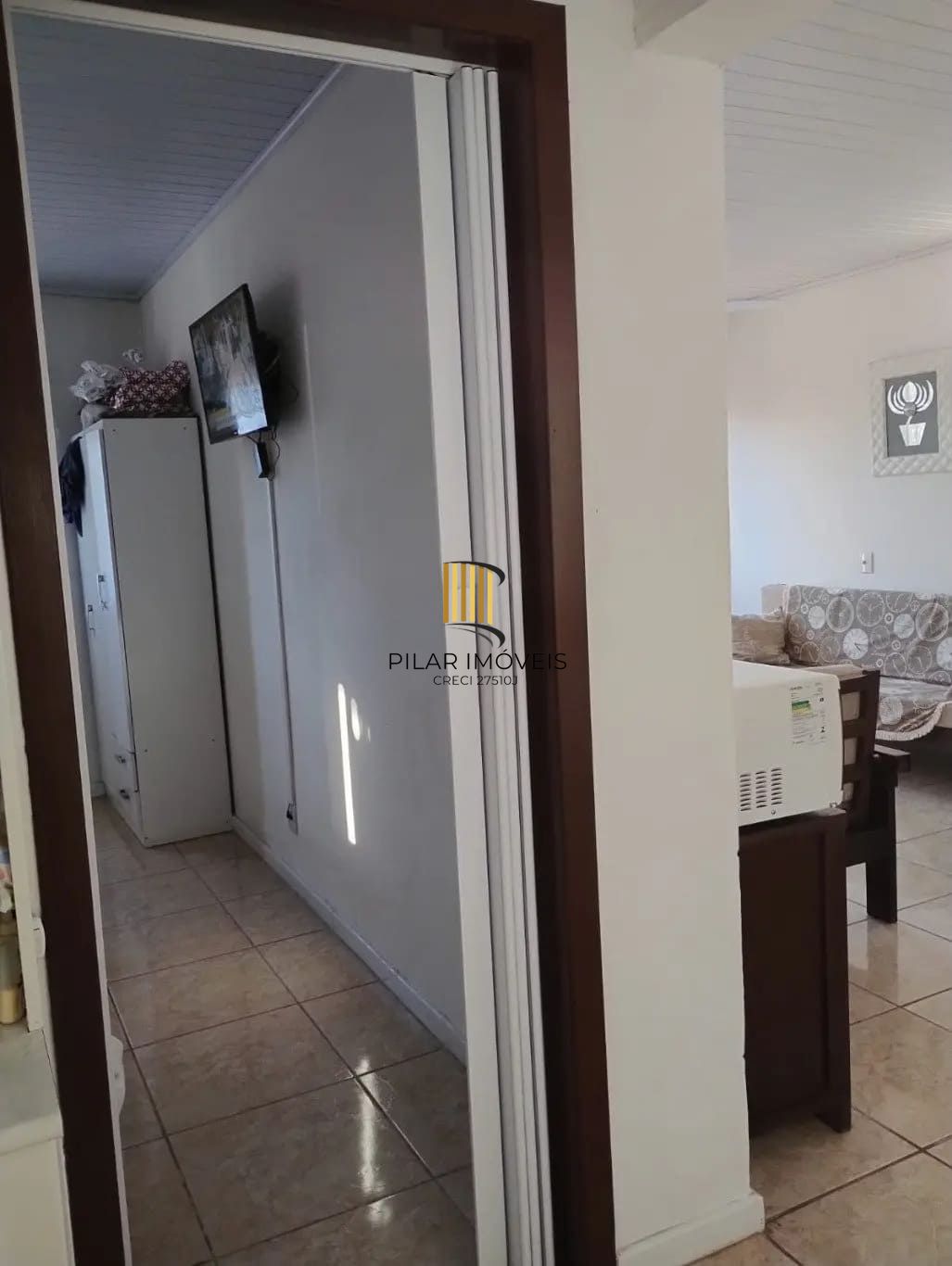 Casa de 3 dormitórios e 111m² à venda em Jardim Botânico, Porto Alegre.