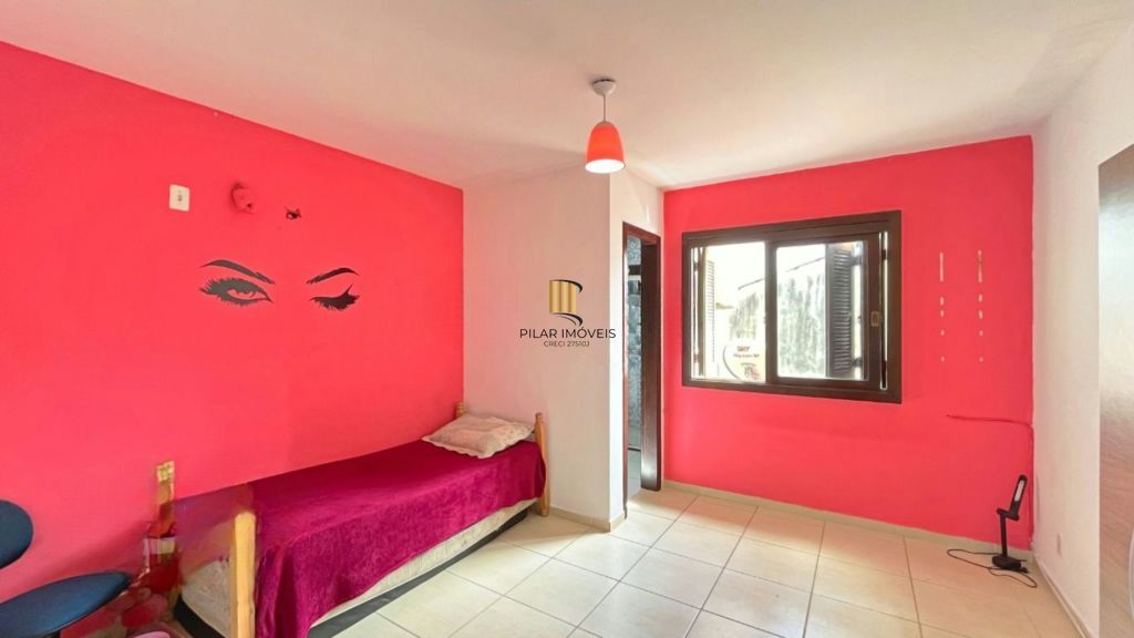 Casa de 2 dormitórios à venda Rua Heitor Kramer, Guarujá - Porto Alegre