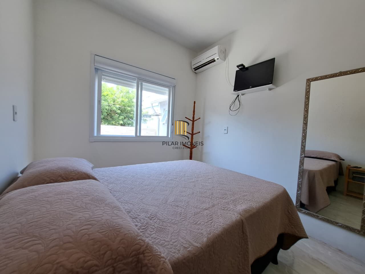 Casa com 04 dormitórios e piscina na praia de Imbé/ RS.
