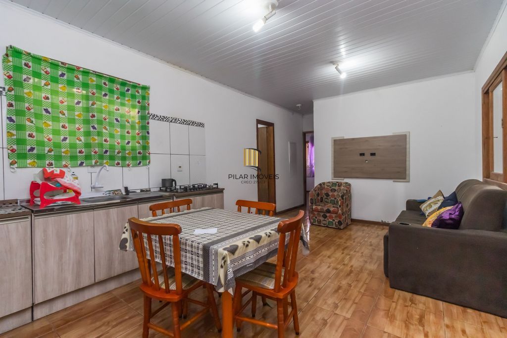 Casa de 6 dormitórios à venda Bairro Vila Nova - Porto Alegre