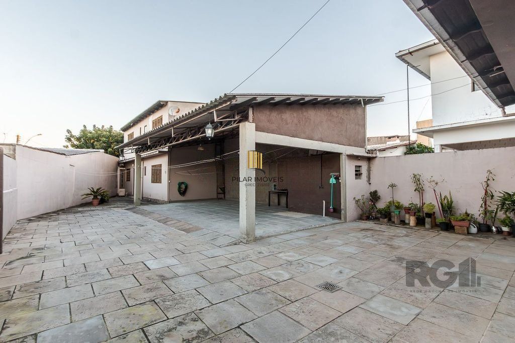 Casa de 4 dormitórios no bairro Santa Rosa de Lima