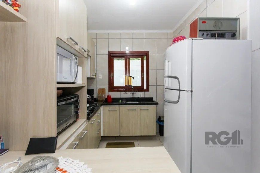 Casa em condomínio com 3 dormitórios, 1 vaga no bairro Nossa Senhora das Graças, Canoas!