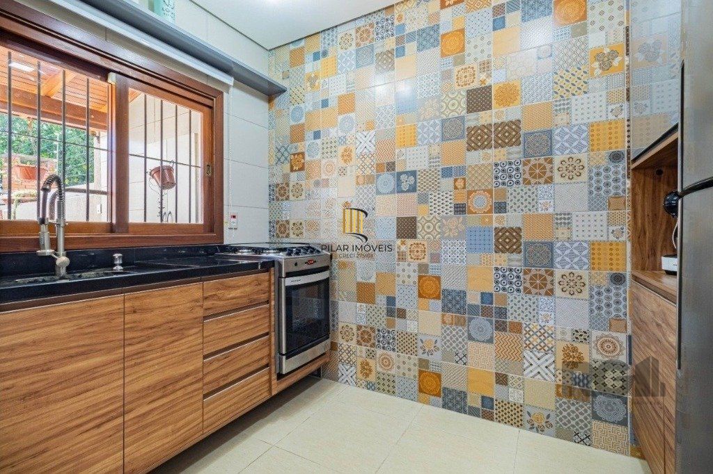 Casa de 3 dormitórios no bairro Cavalhada