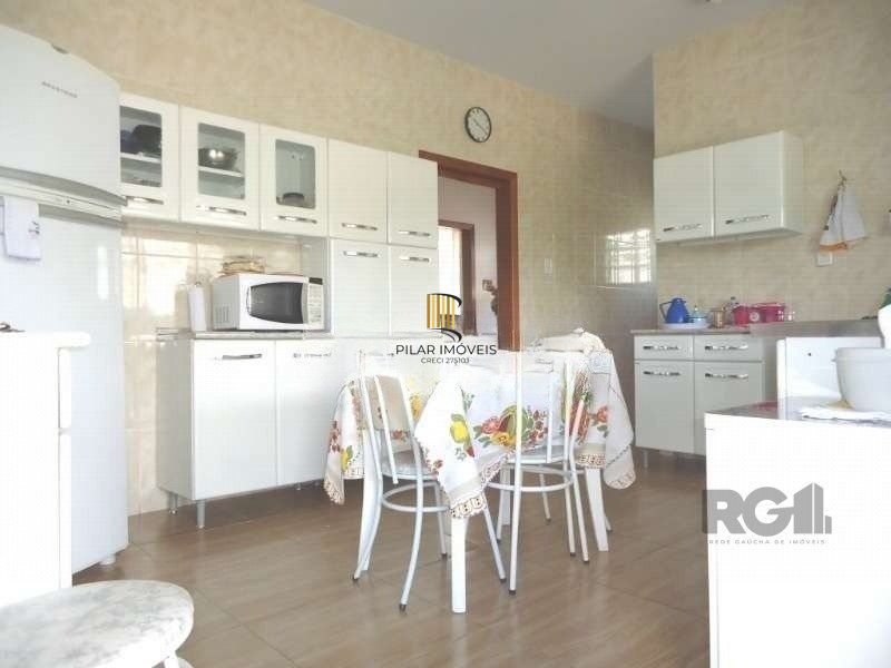 Casa 3 dormitórios no bairro Partenon