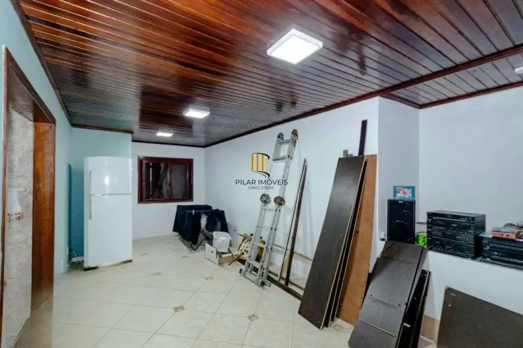 Casa à venda com 3 dormitórios, 1 suíte e espaço gourmet em terreno alto