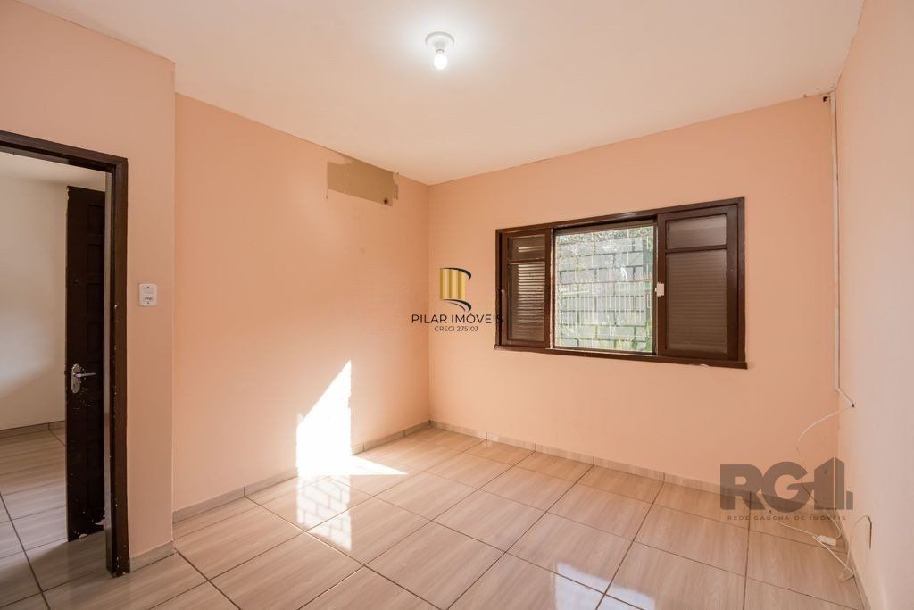 Casa de 159m² - 2 dormitórios, 3 vagas no bairro Rubem Berta