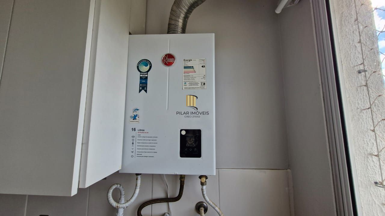 Apartamento de 2 dormitórios sendo 1 suíte, sala cozinha e garagem