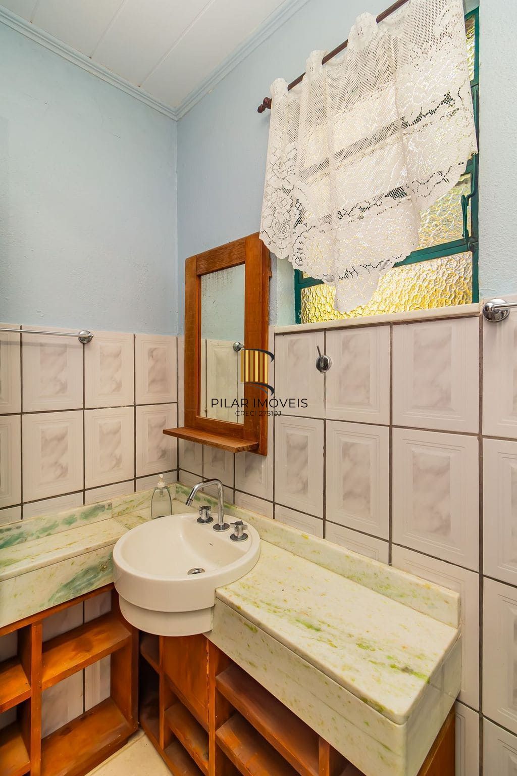 Casa de 3 dormitórios, no Bairro Ponta Grossa - Porto Alegre