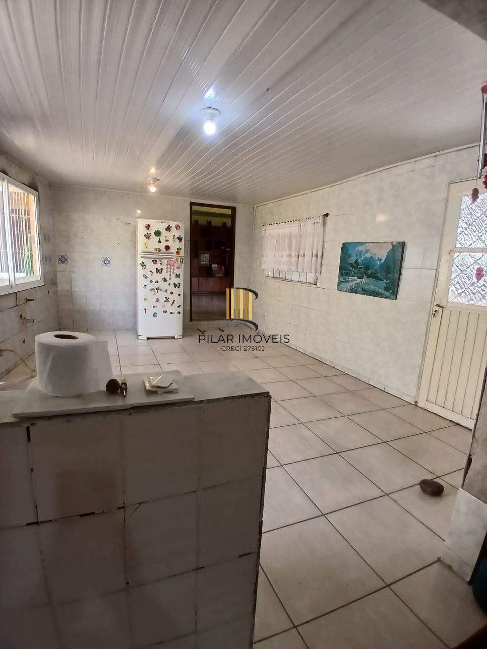 Ampla casa com patio no bairro Rubem Berta .