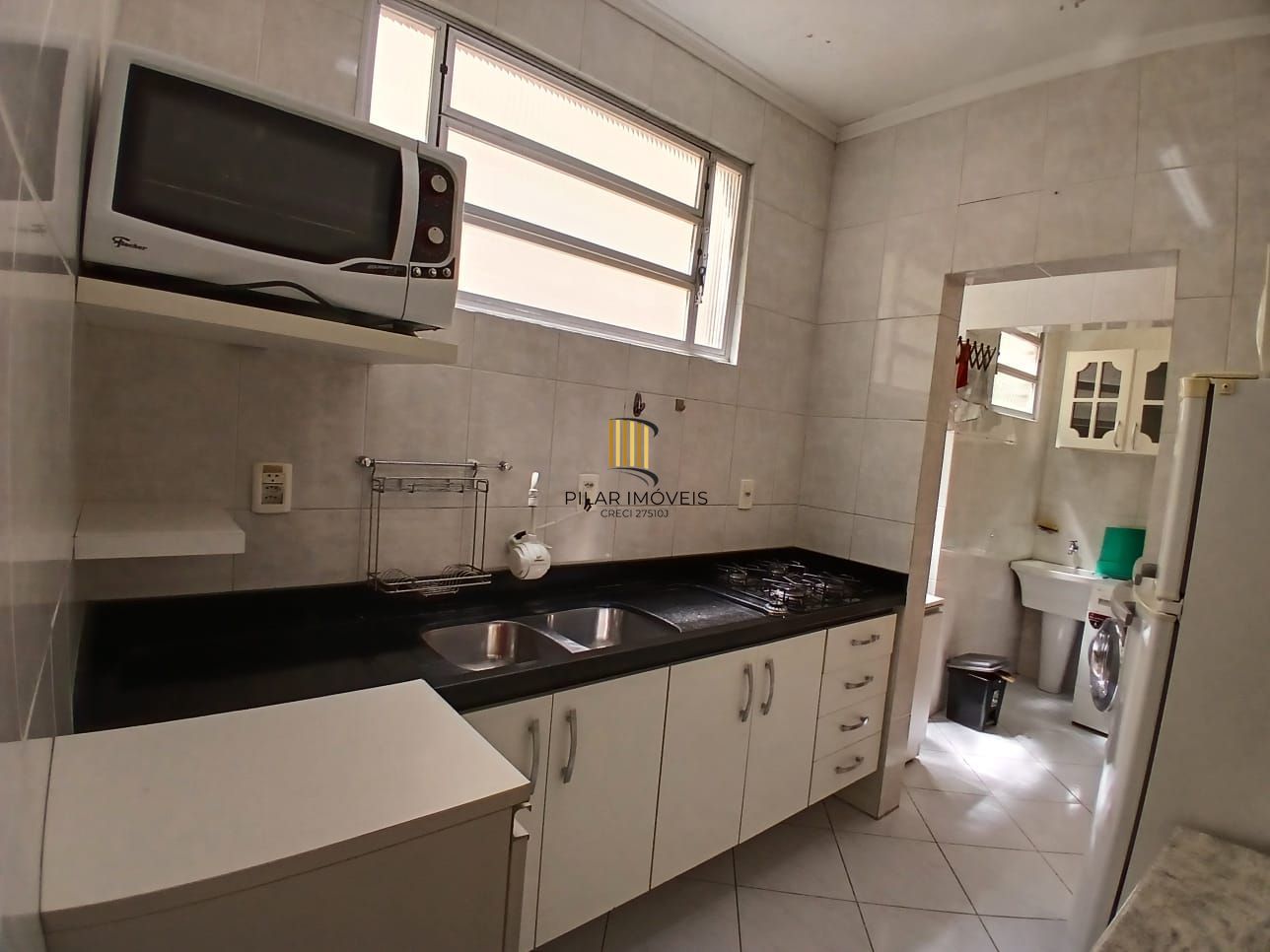 Apartamento de 02 dormitórios no bairro Independencia em Porto Alegre /RS.
